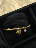 Heart charm handcuff
